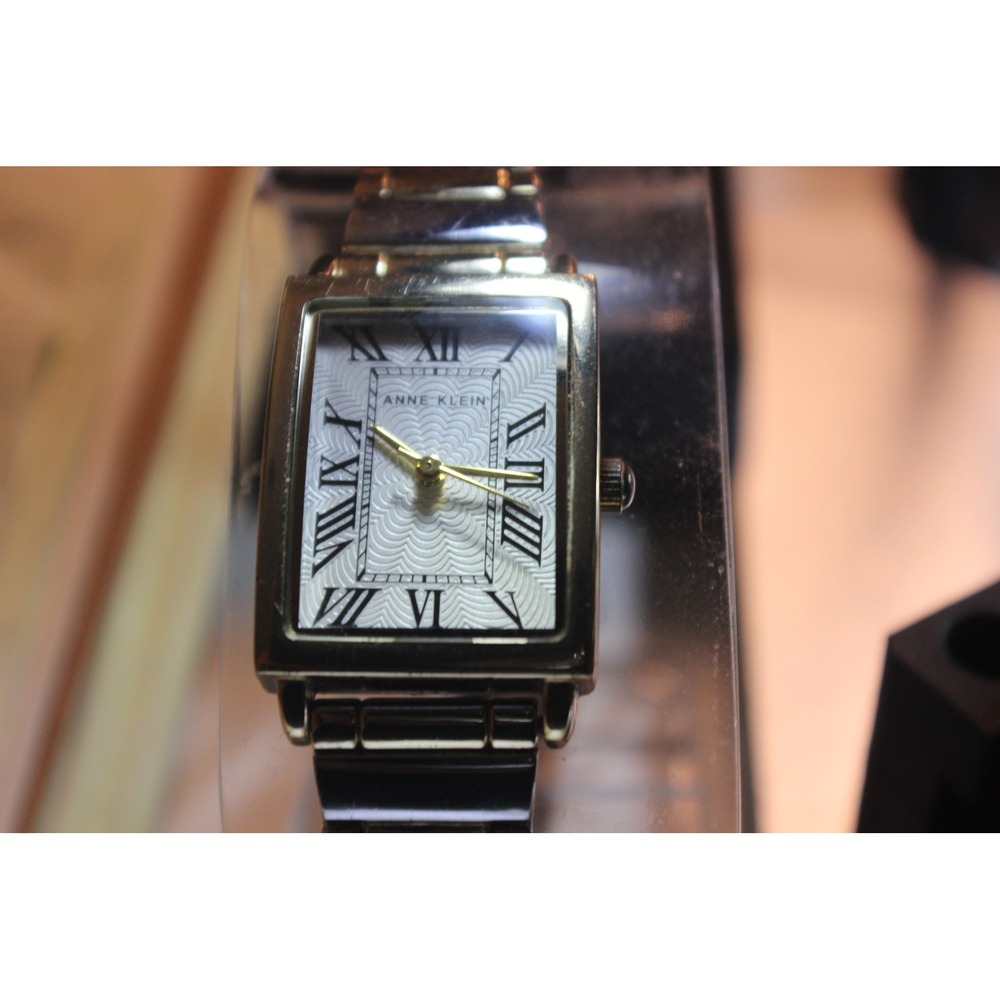 Anne Klein Womens Silver Tone Rectangular Roman Numeral Tank Watch AK/6087